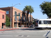 train-line-next-to-mission-meridian-commercial-and-loft-buildings